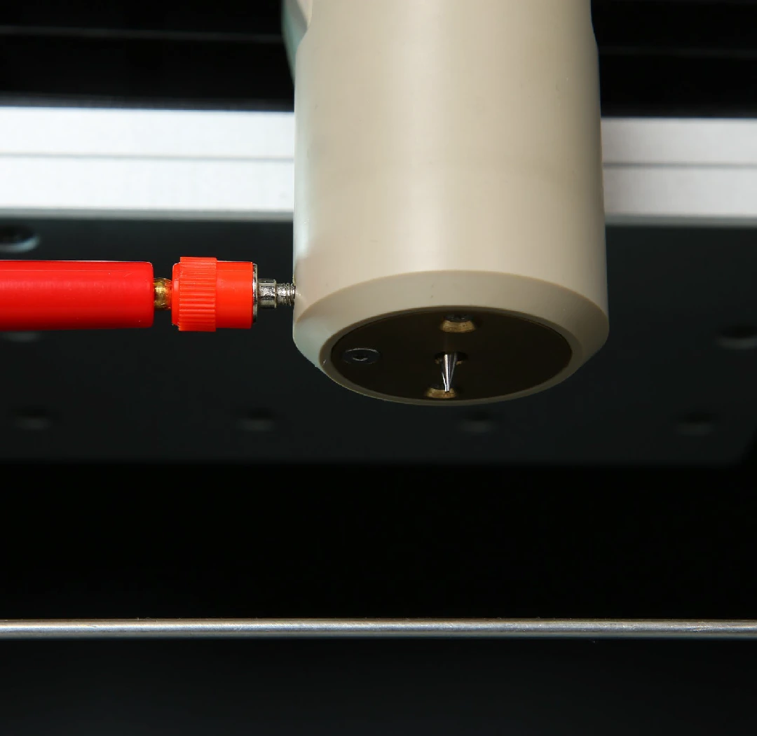 Heated spinneret and X-Y motion
